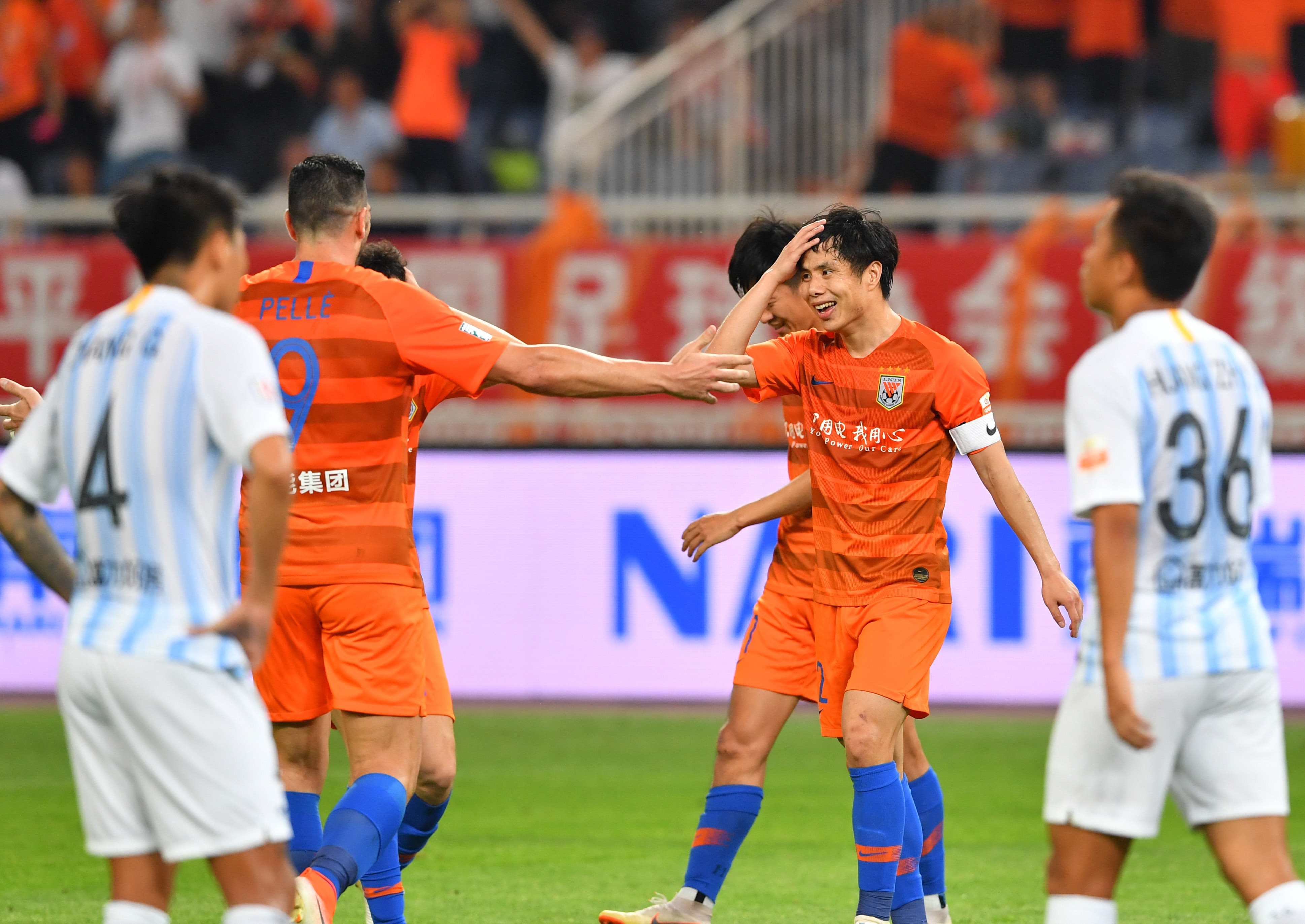 爱游戏官方-广州富力中超首场比赛取胜